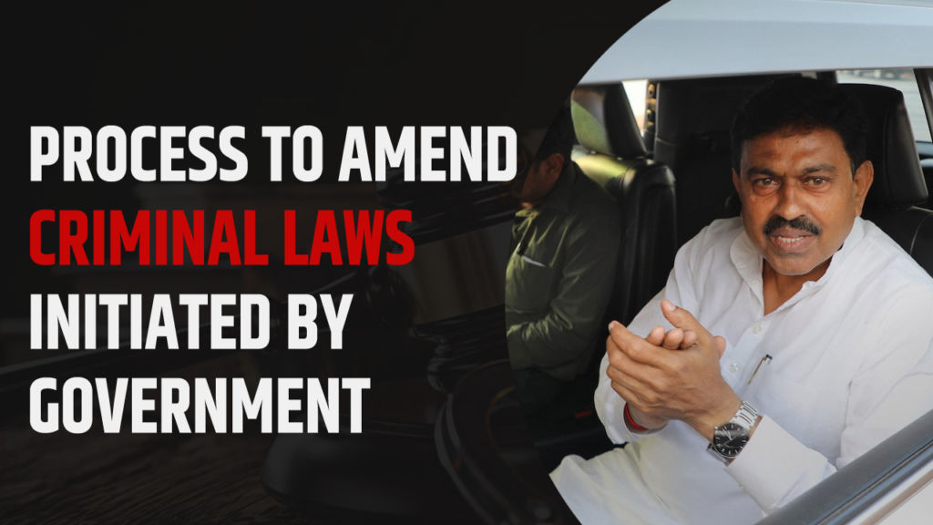 A man inside the car and heading process to amend criminal laws initiated by government